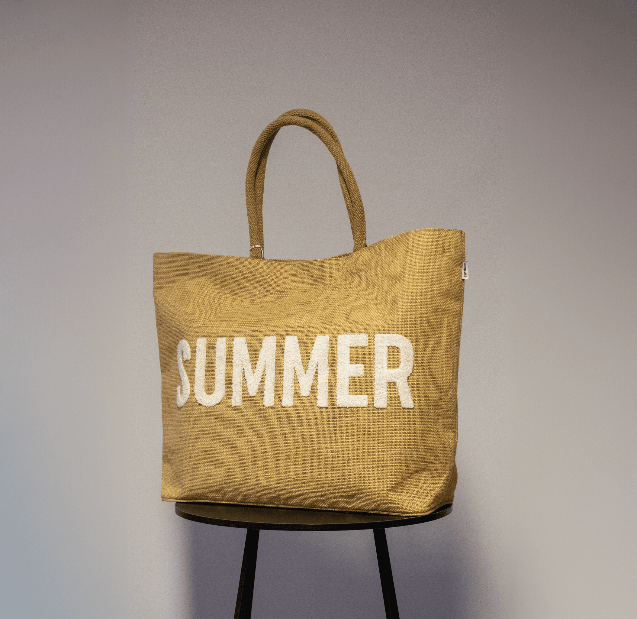 Jute draagtas in natuurkleur met witte opdruk SUMMER, stevige hengsels, duurzame shopper